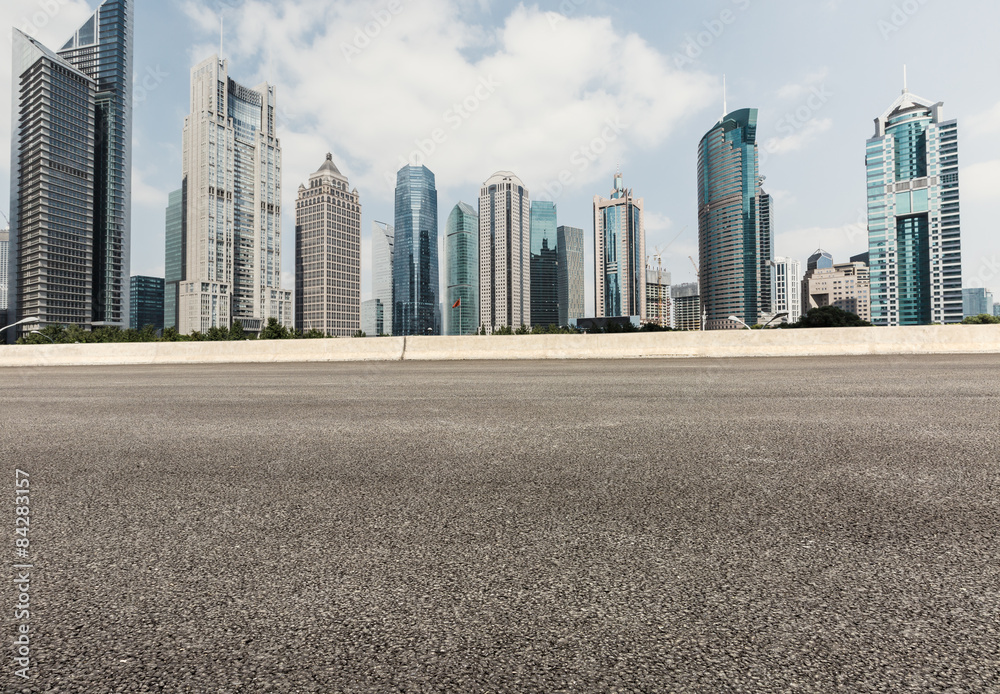 Asphalt road in front of the modern city锛� in Shanghai锛宑hina銆�