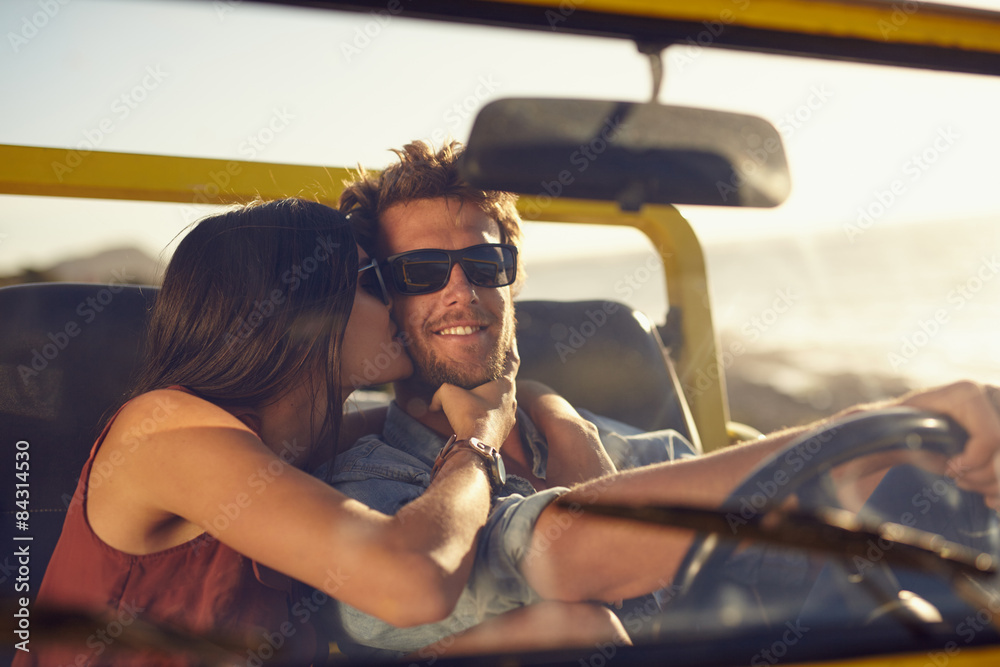 Loving young couple on road trip