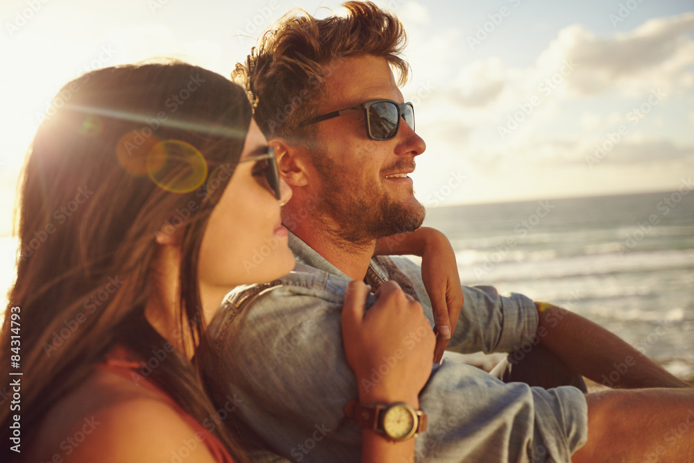 Couple enjoying the beach view.