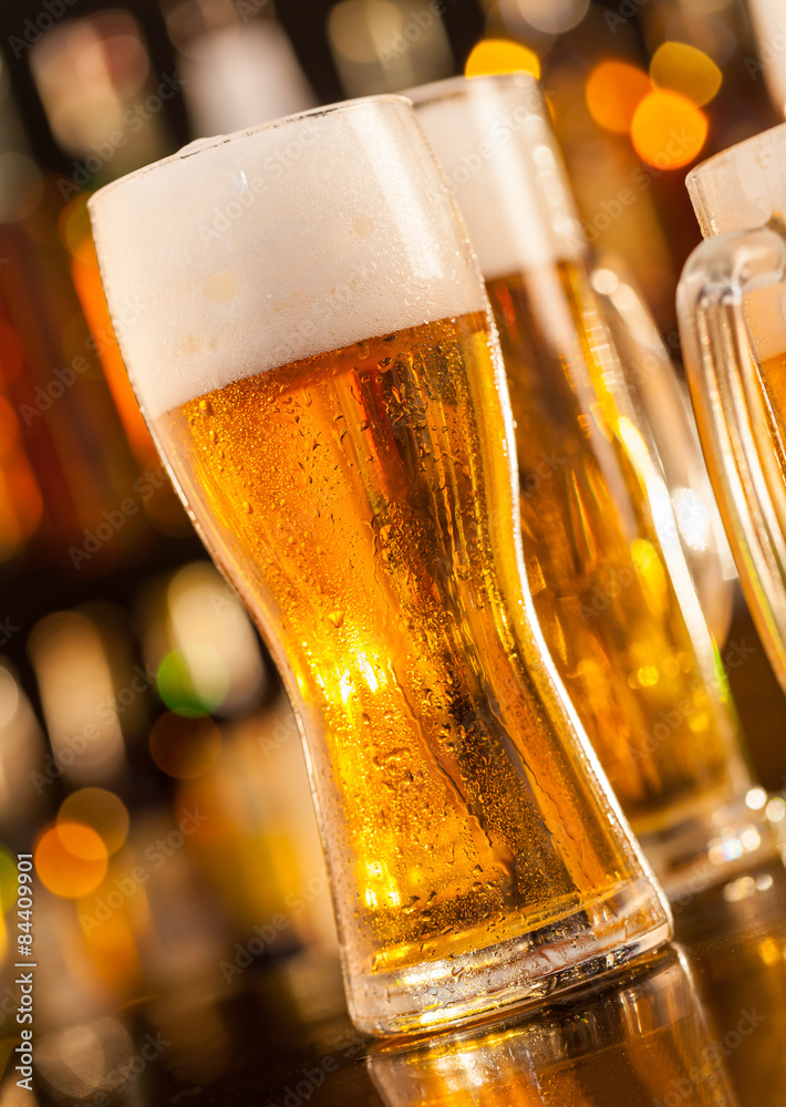 Jug of beer served on bar counter