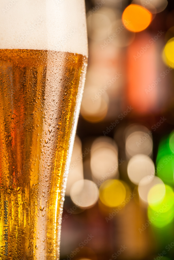 Jug of beer served on bar counter