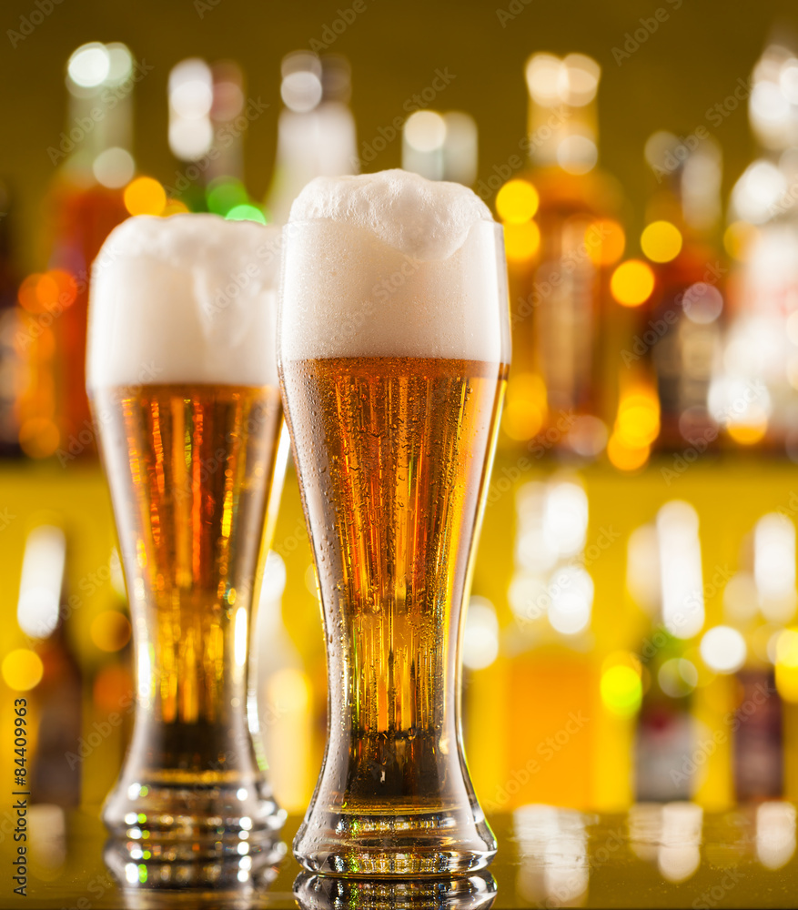 Jugs of beer served on bar counter