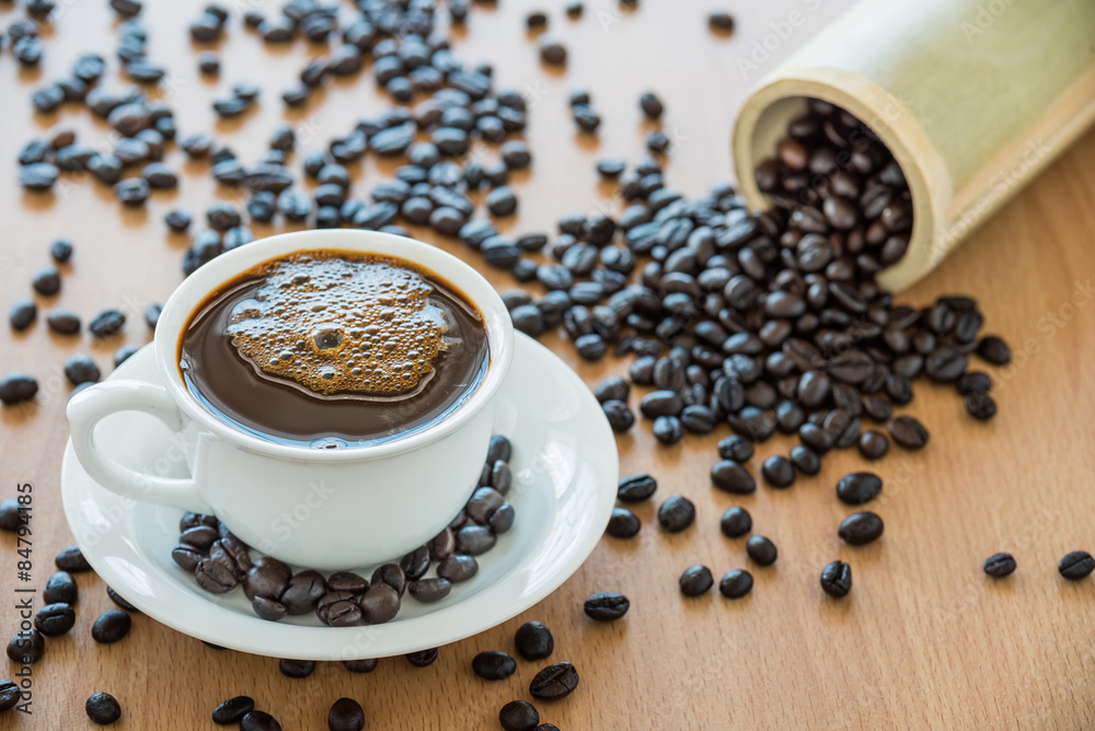 cup of coffee and coffee beans