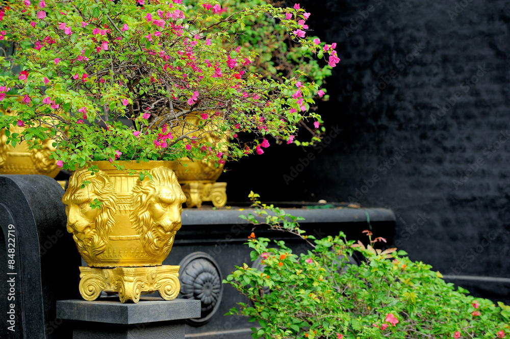 Flowers in a large vase in the garden