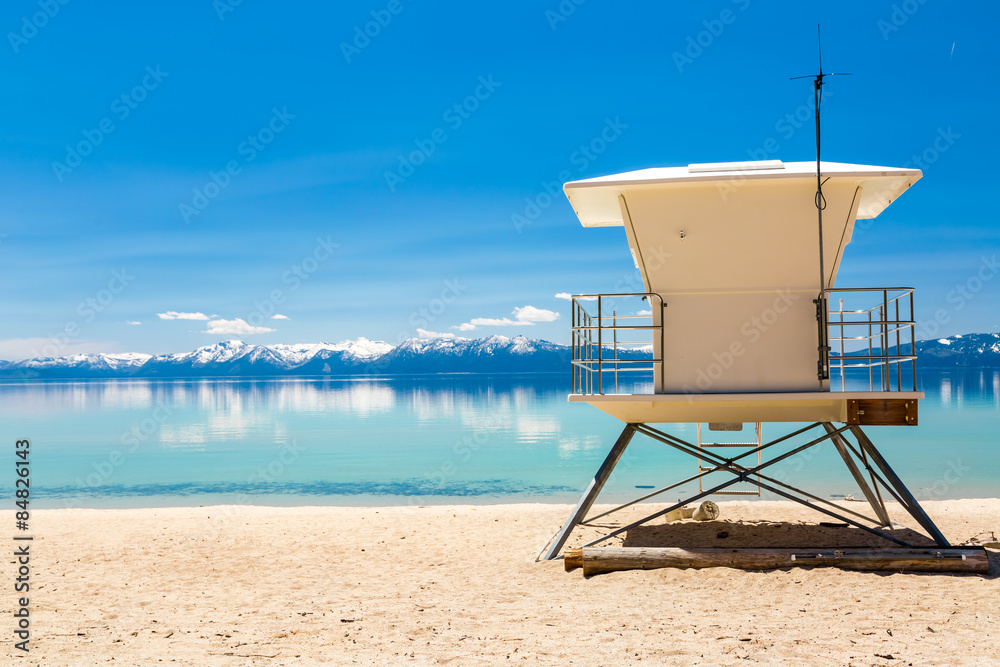 Lake beach with lifeguard patrol station.