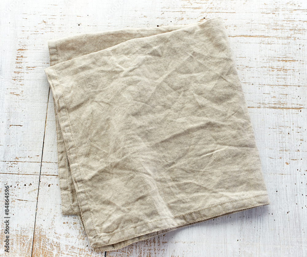 linen napkin on wooden table