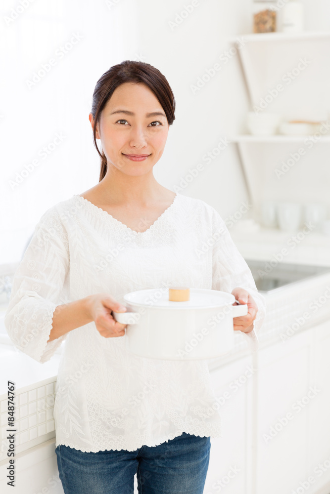 young asian woman in the kitchen