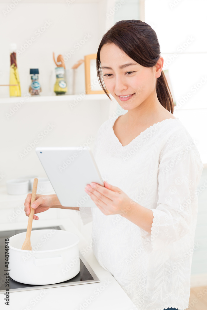 young asian woman in the kitchen