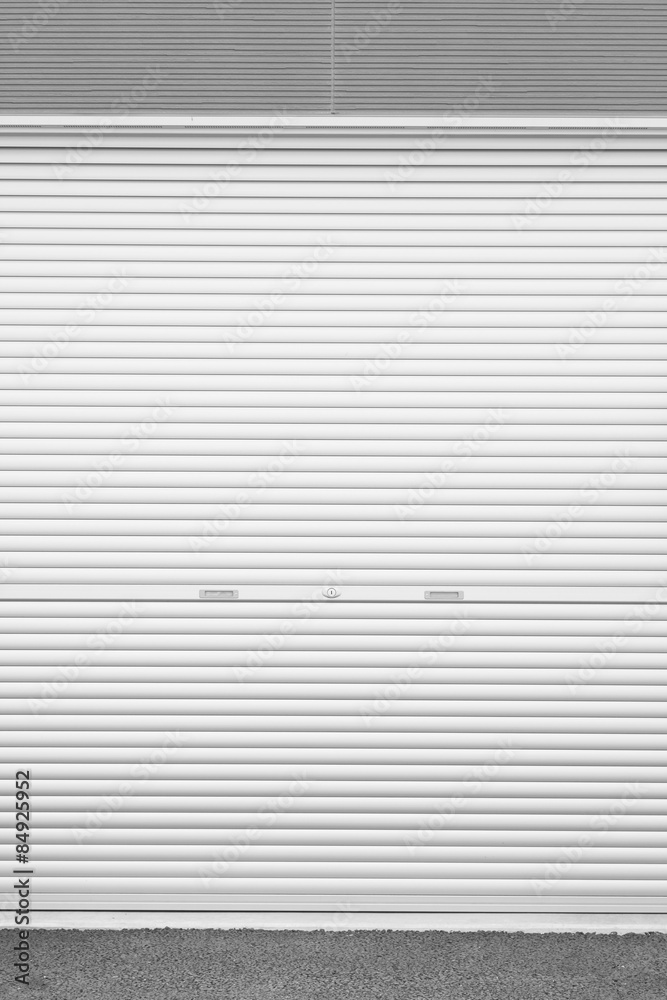 White metal roller door shutter background and texture..