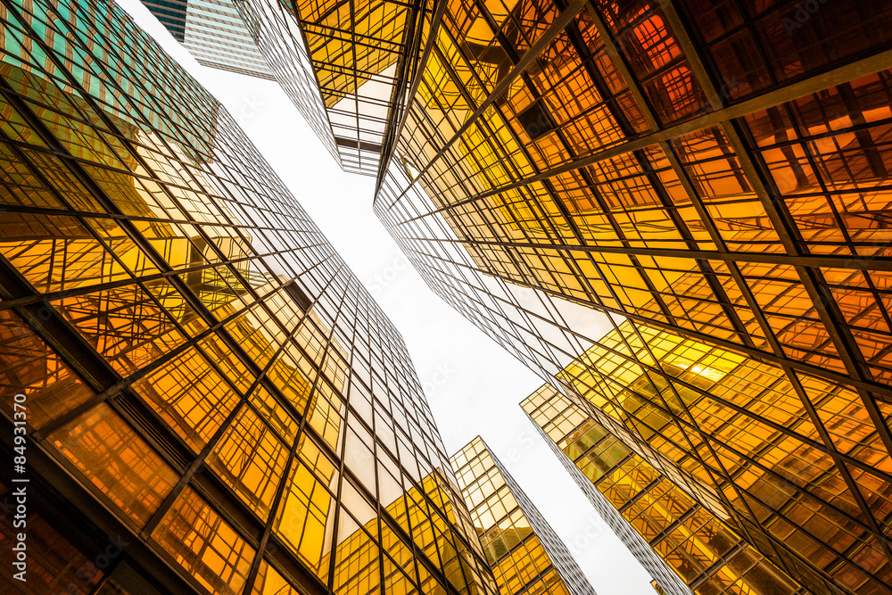 low angle view of modern skyscraper exterior and sky