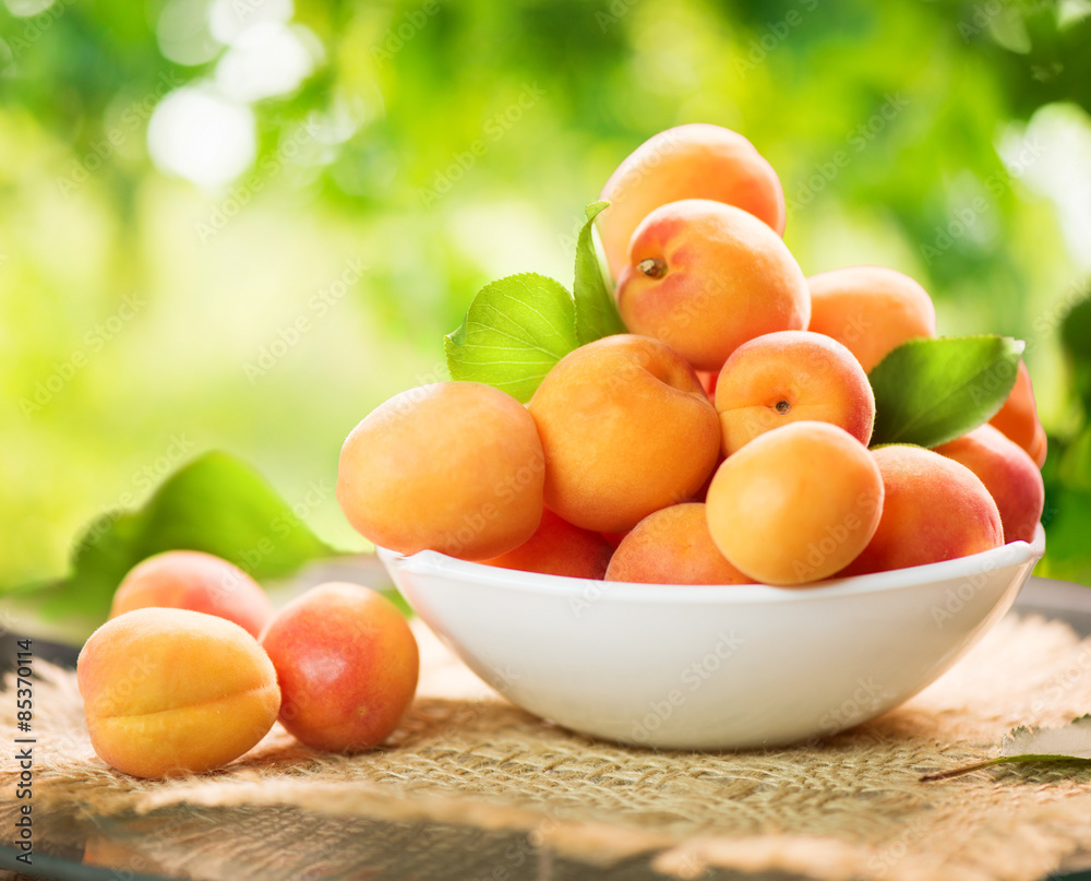 Apricot. Ripe organic apricots on a wooden table