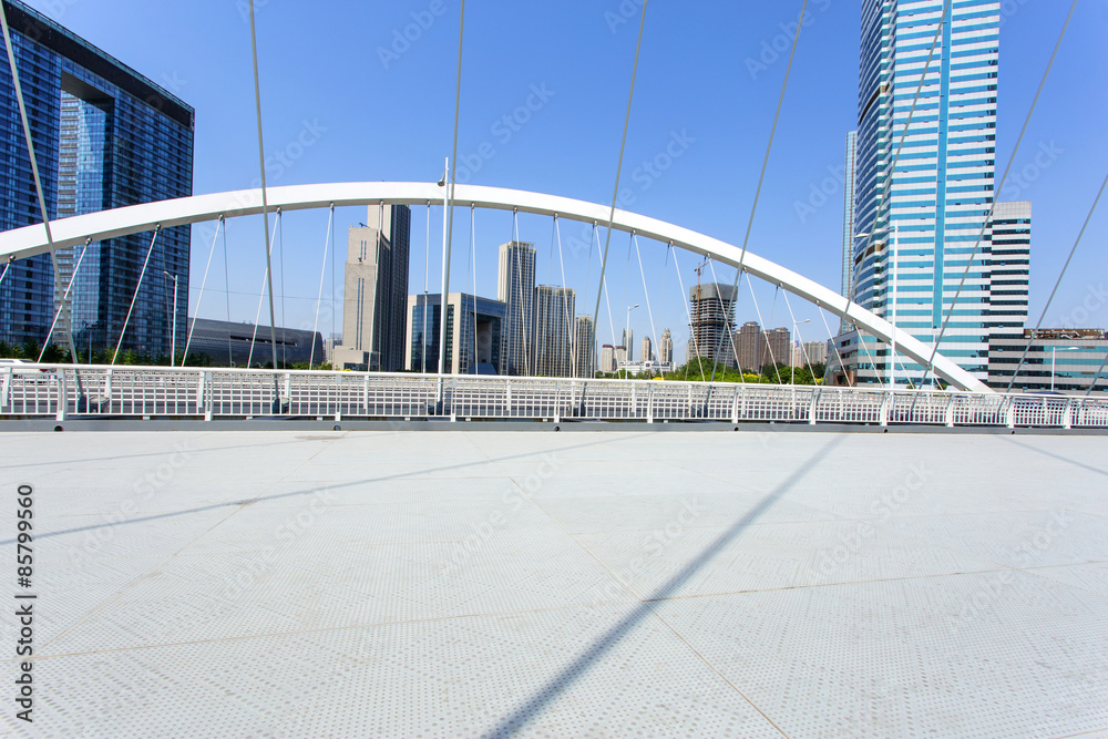 Modern city skyline with empty road floor