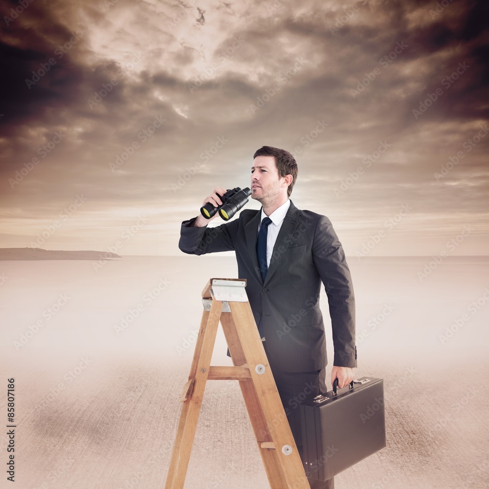 Composite image of businessman looking on a ladder