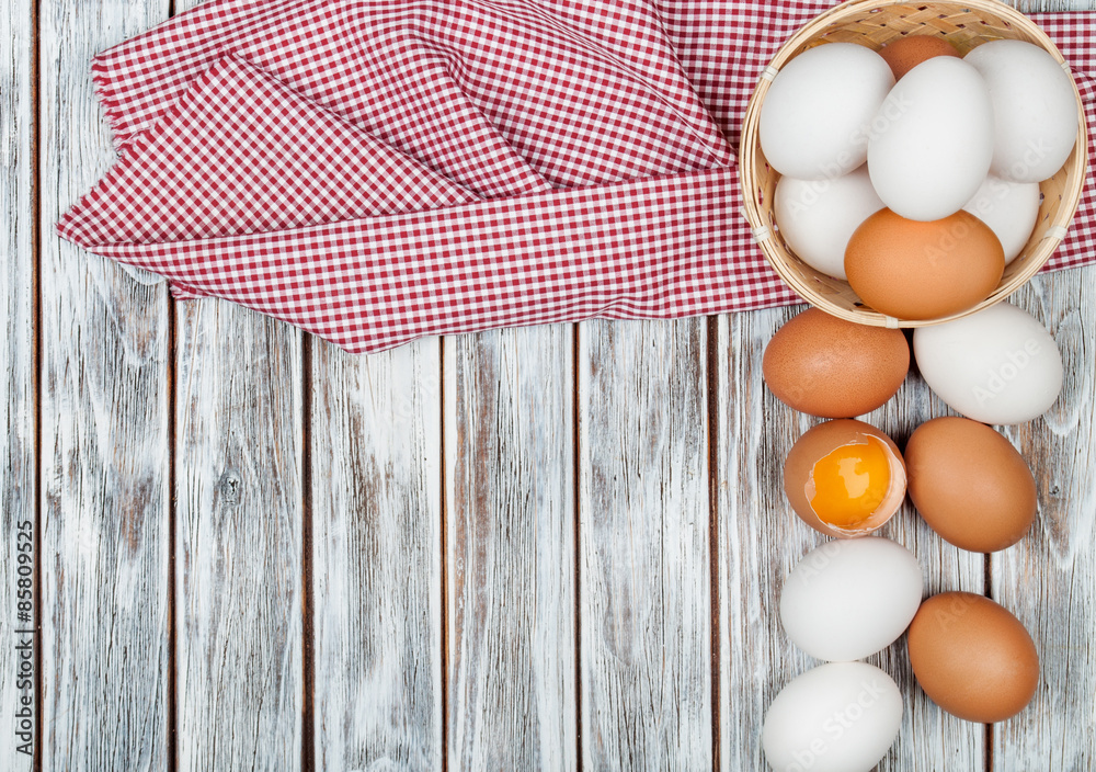 Eggs on wooden table background