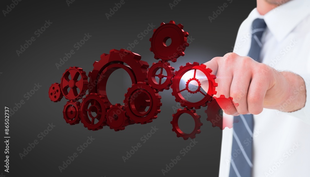 Composite image of businessman in shirt presenting at camera 