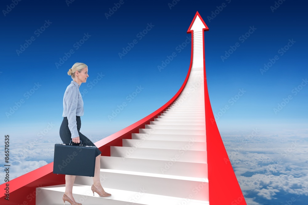 Composite image of businesswoman climbing with briefcase