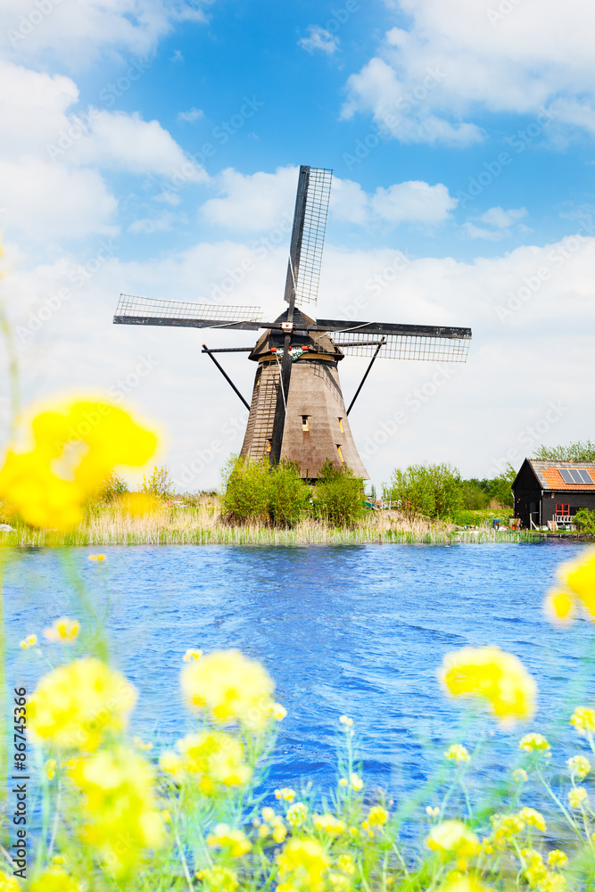 Old windmill in Kinderdijk at spring