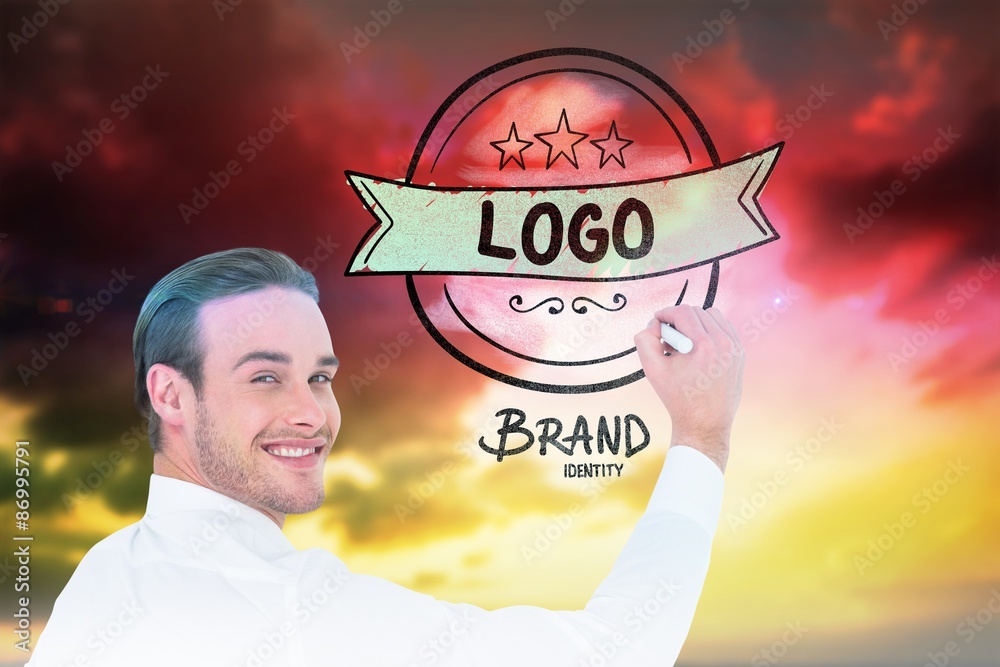 Composite image of cheerful businessman writing with marker