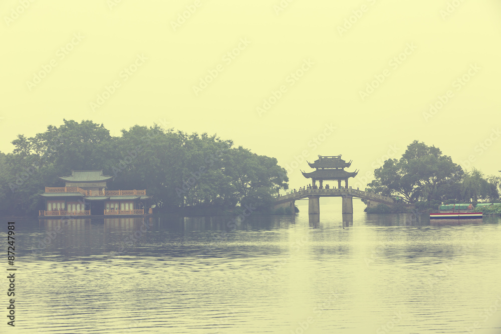 The beautiful hangzhou west lake scenery in a misty morning，China