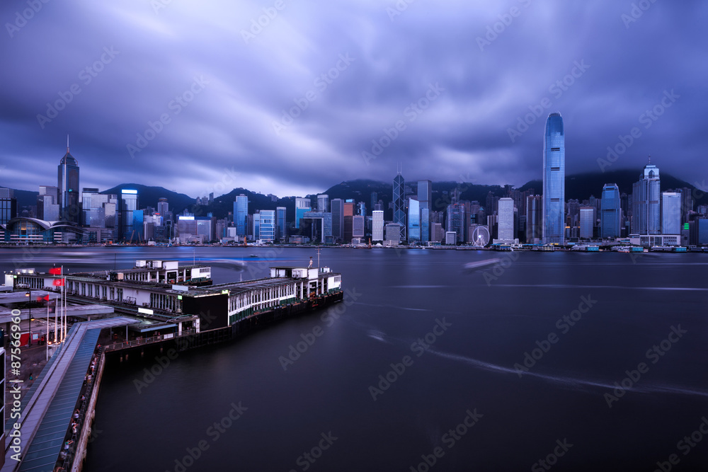 skyline and  buildings in harbor of hong kong