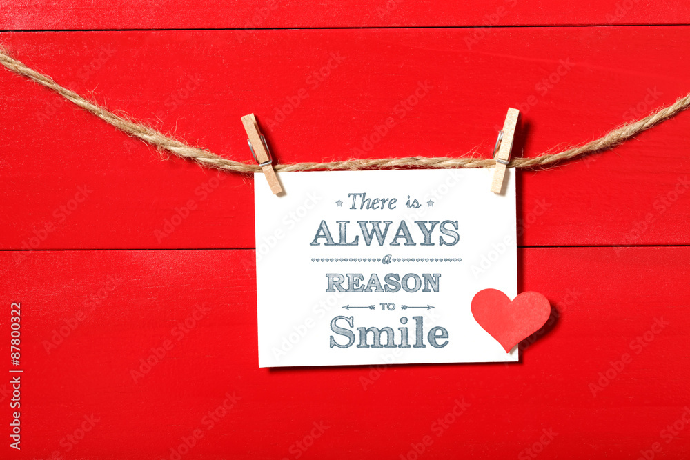 There is always a reason to smile message with clothespins