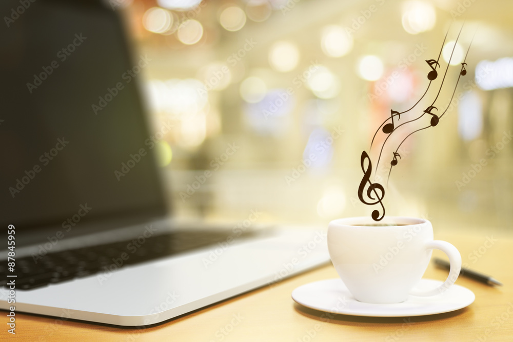 cup of coffee, laptop and musical notes, concept