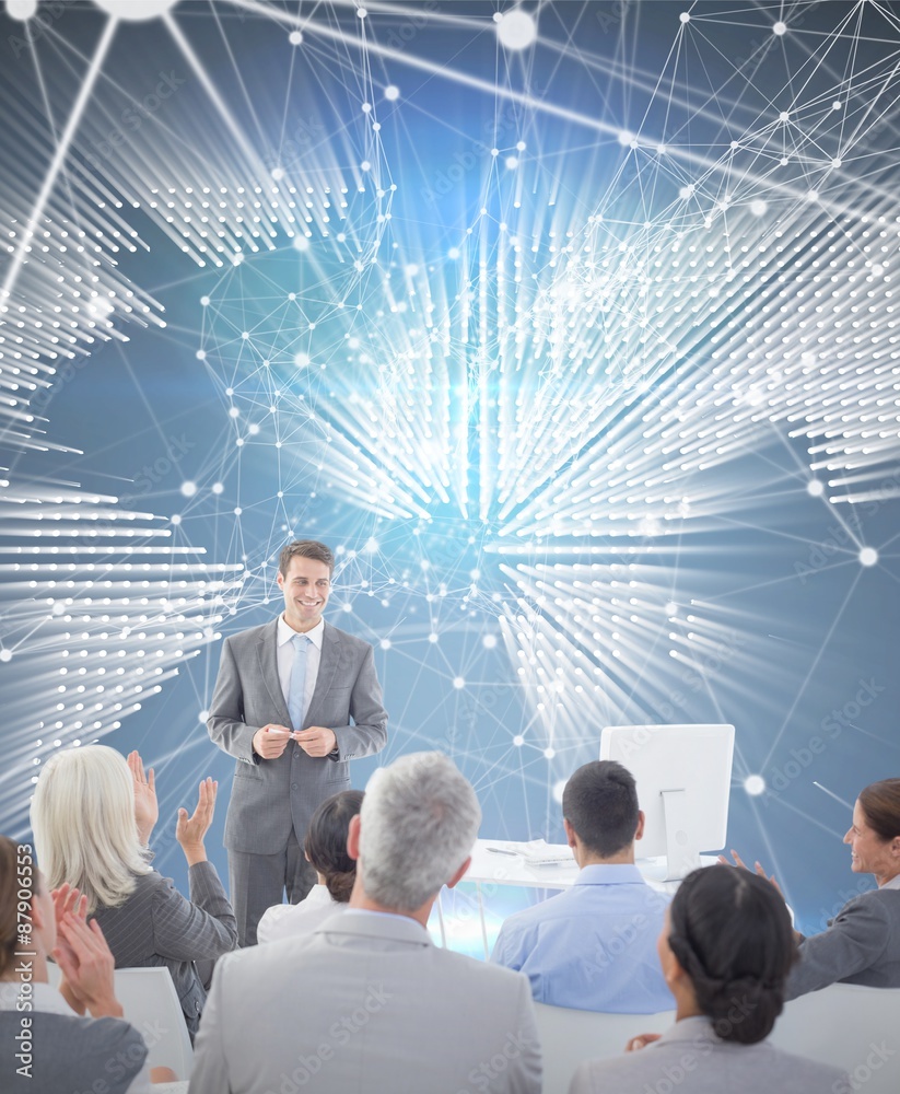 Composite image of businessman doing speech during meeting 