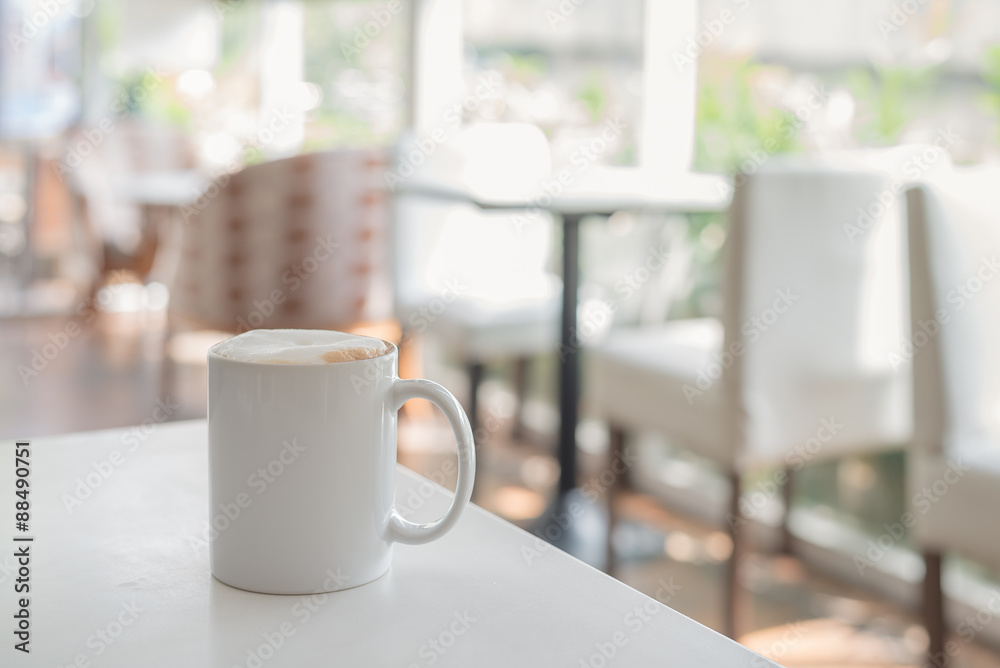 white coffee cup in coffee shop