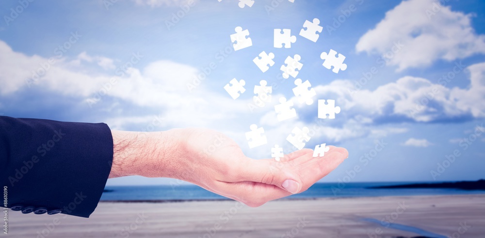 Composite image of close up of businessman with empty hand open