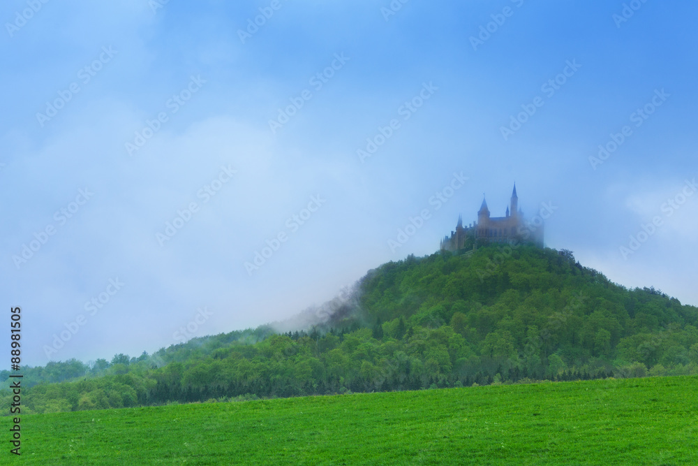 Landscape and Hohenzollern castle in haze