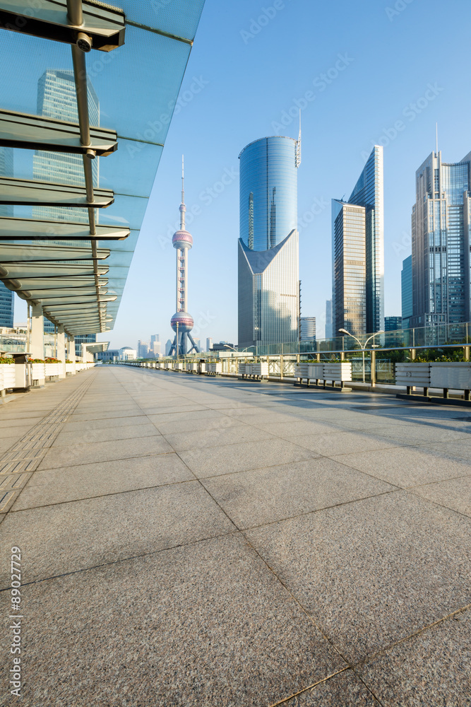 Empty road in front of the modern architecture，in Shanghai, China