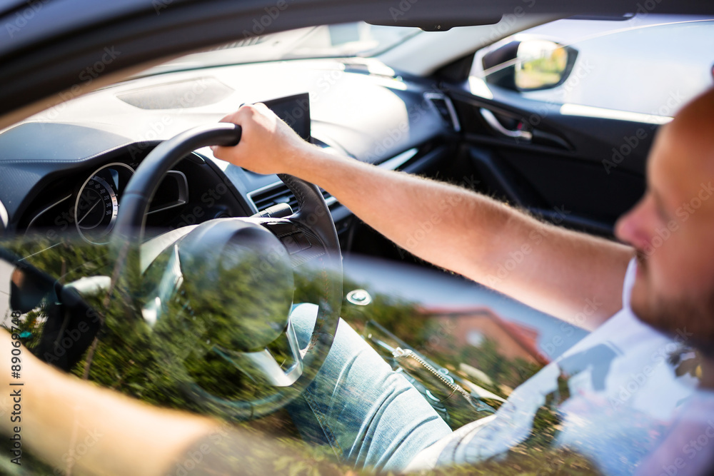 Man driving a car