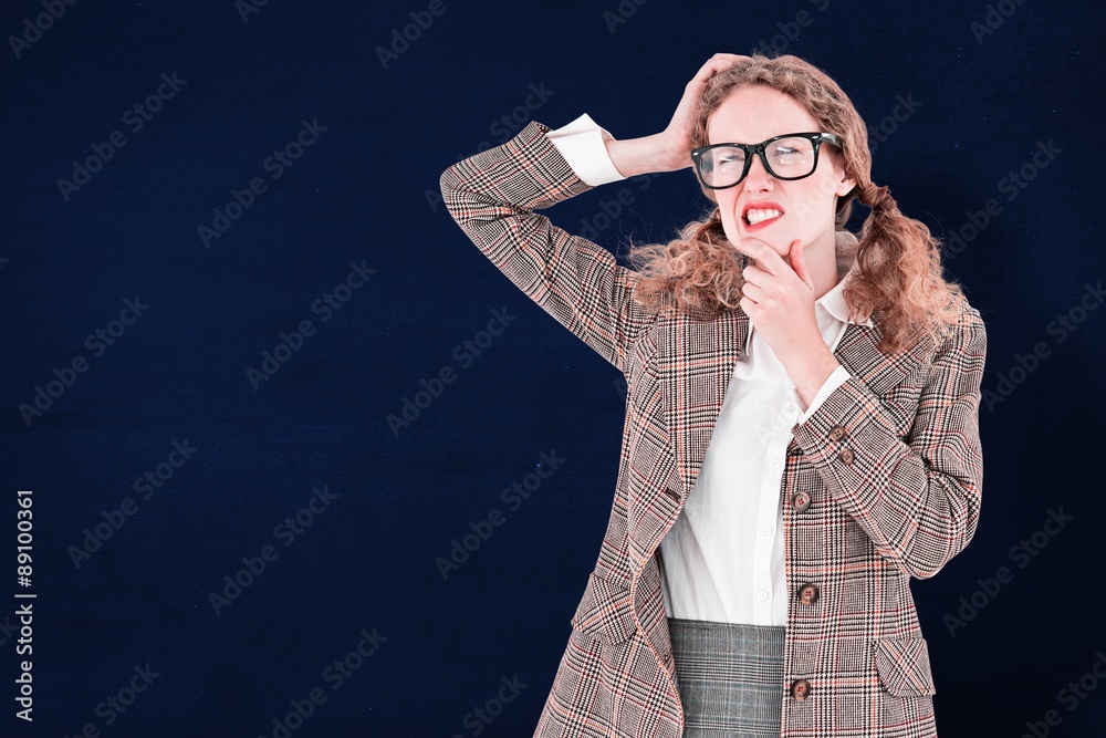 Composite image of geeky hipster thinking 