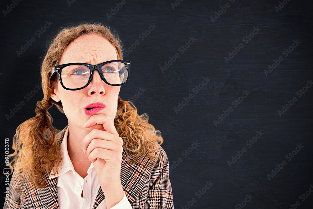 Composite image of geeky hipster woman thinking