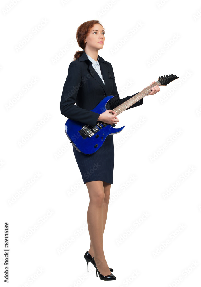 Businesswoman with guitar