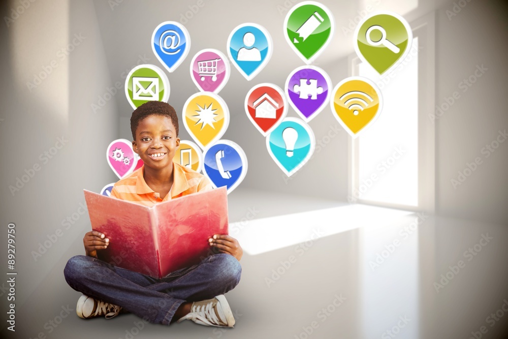 Composite image of cute boy reading book in library