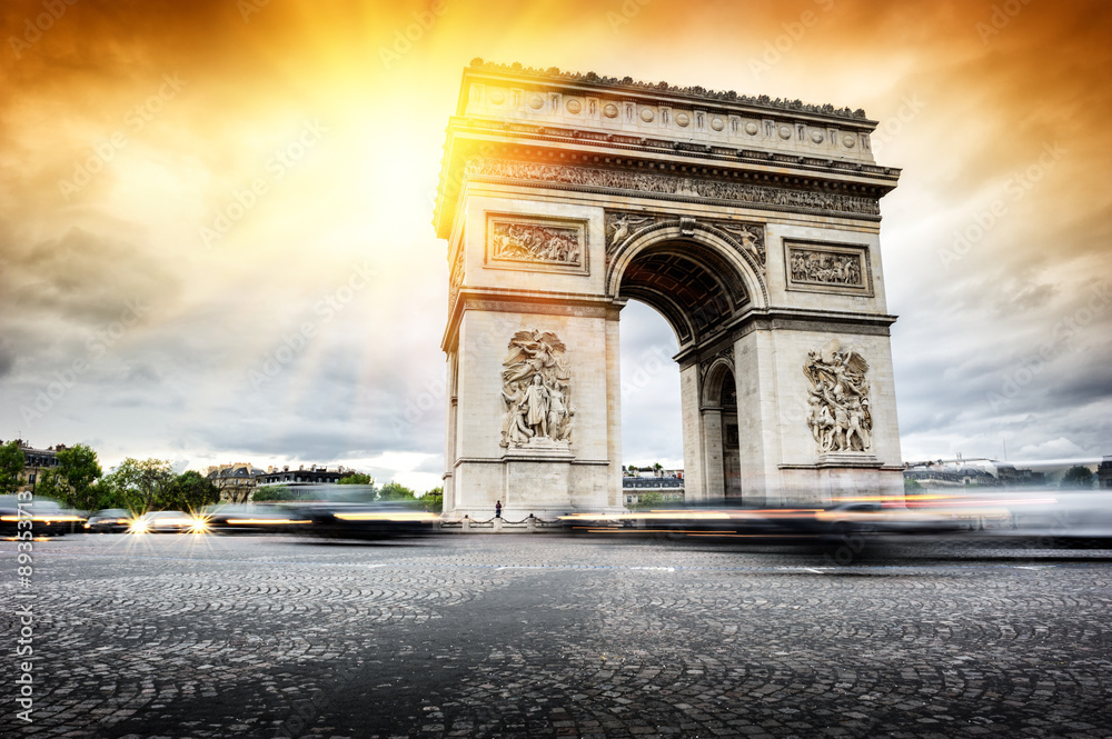 Beautiful sunset over Arc de Triomphe, Paris