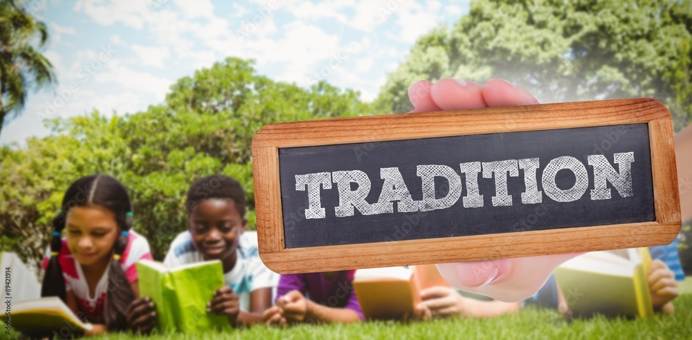 Tradition against children lying on grass and reading books