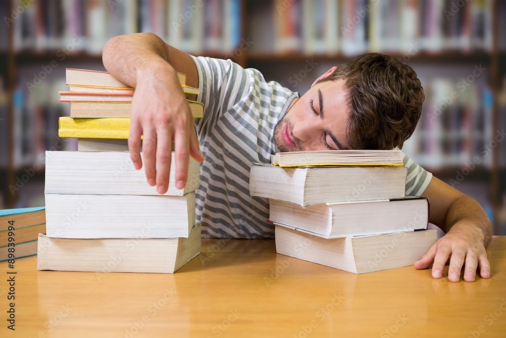 Composite image of student asleep in the library