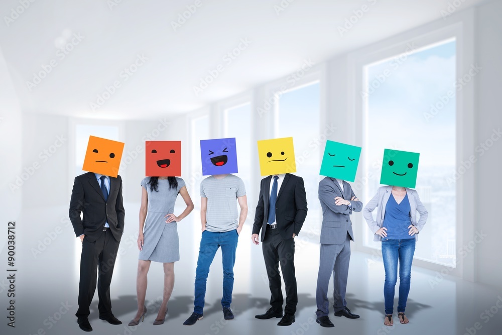 Composite image of people with boxes on their heads