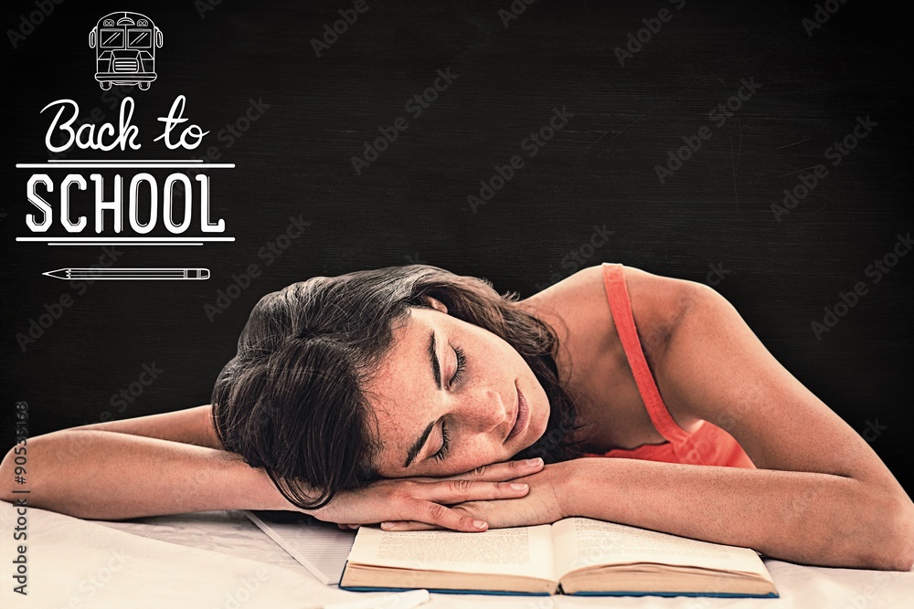 Composite image of sleeping student head on her books