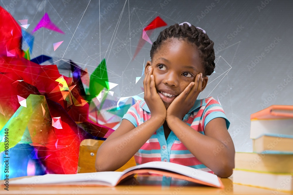 Composite image of pupil sitting at her desk 