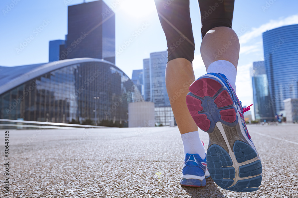 Woman running in the city