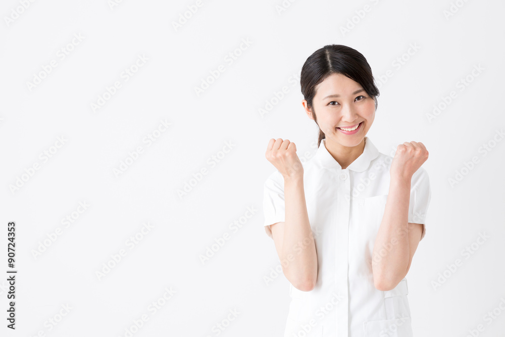 young asian nurse on white background