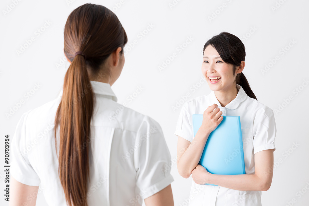 young asian nurse isolated on white background