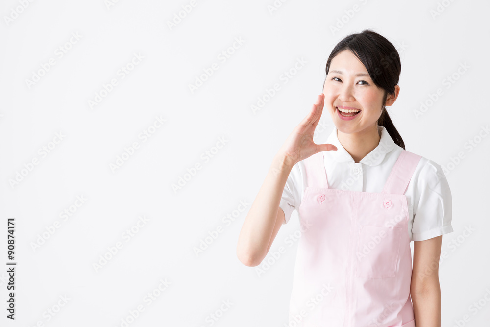 young asian care worker isolated on white background