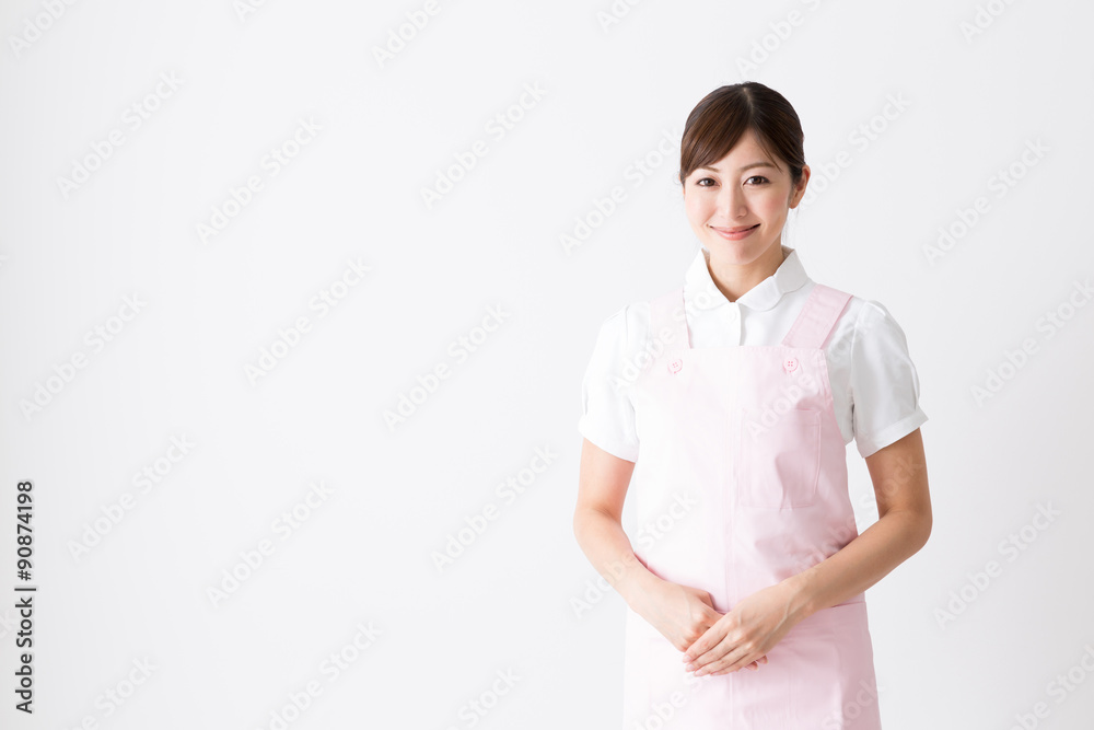 young asian care worker isolated on white background