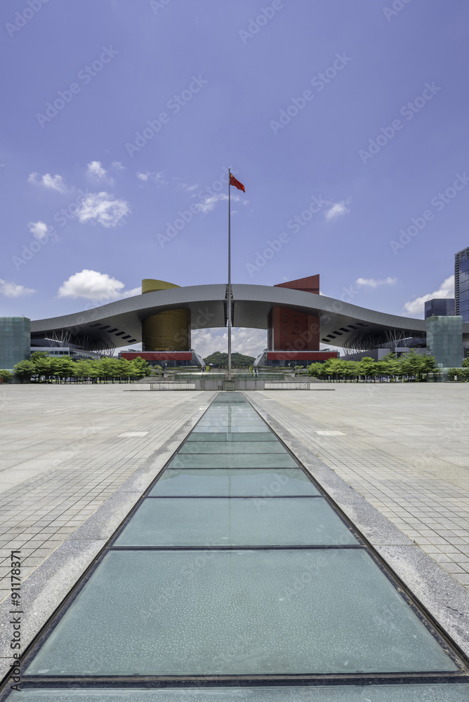 a landmark located in the square of Shenzhen with red and canary