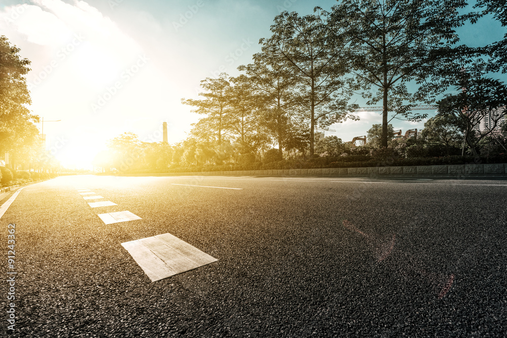 empty asphalt road under sunshine