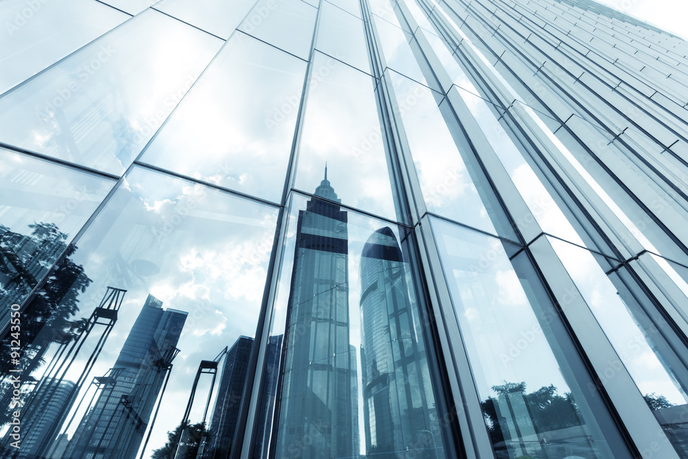 landmarks reflection on glass walls of skyscrapers